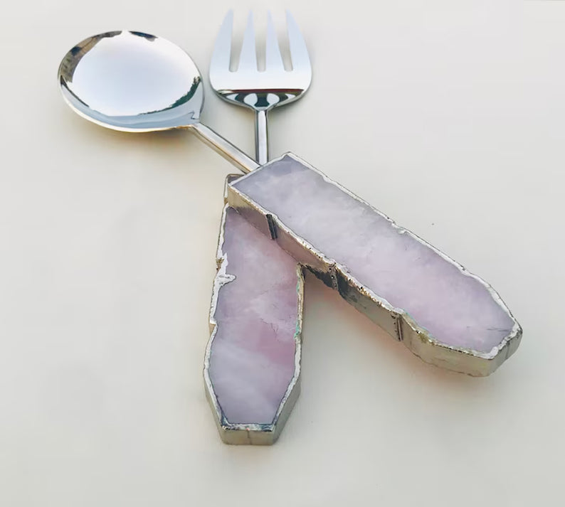 Rose quartz handles on a serving fork and spoon pair