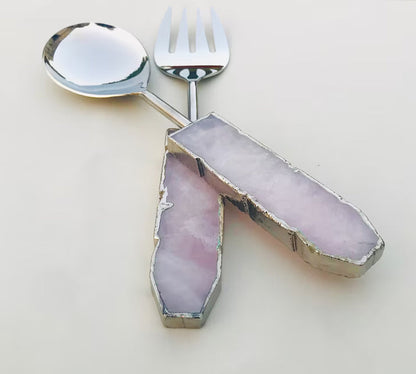 Rose quartz handles on a serving fork and spoon pair