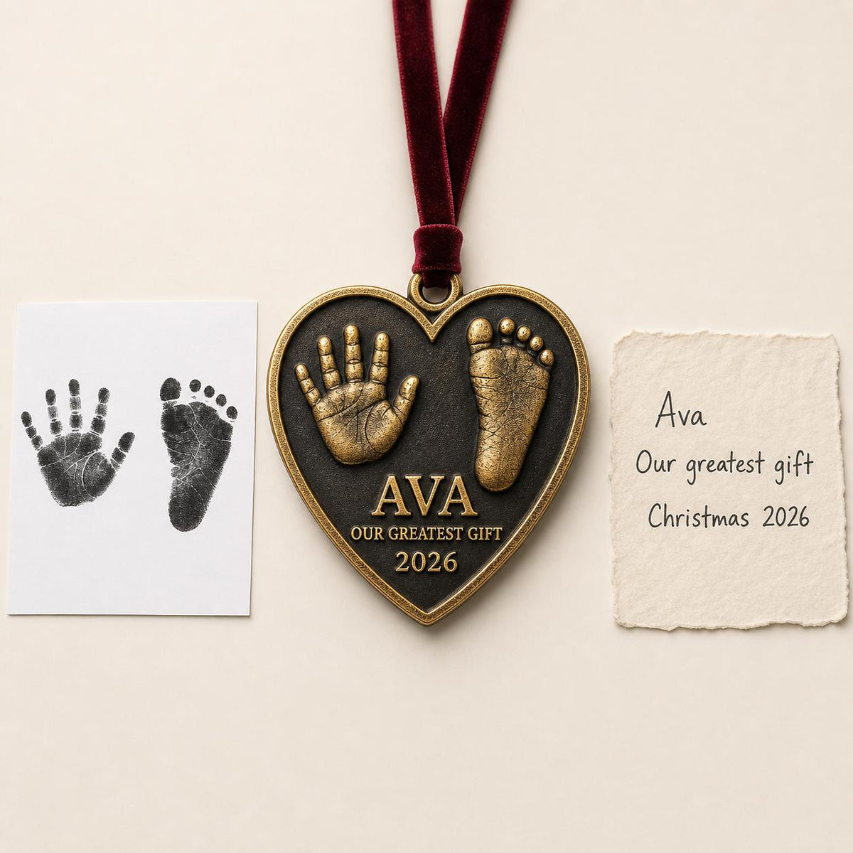 An antique brass heart-shaped baby ornament with a raised handprint and footprint