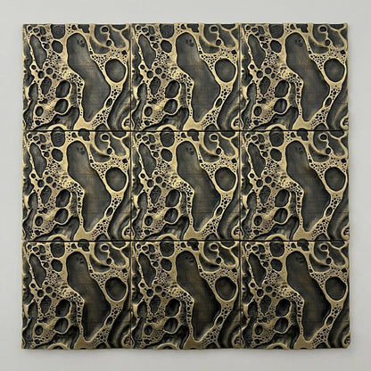 Nine cosmic crater tiles in antique brass