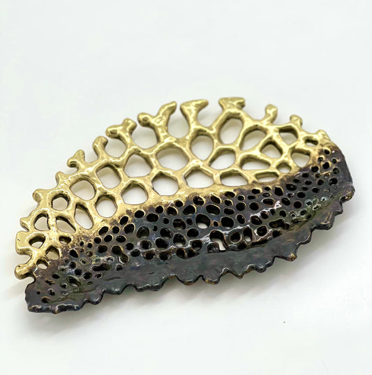 
Fossil lattice tray in a gold and dark antique ombre finish