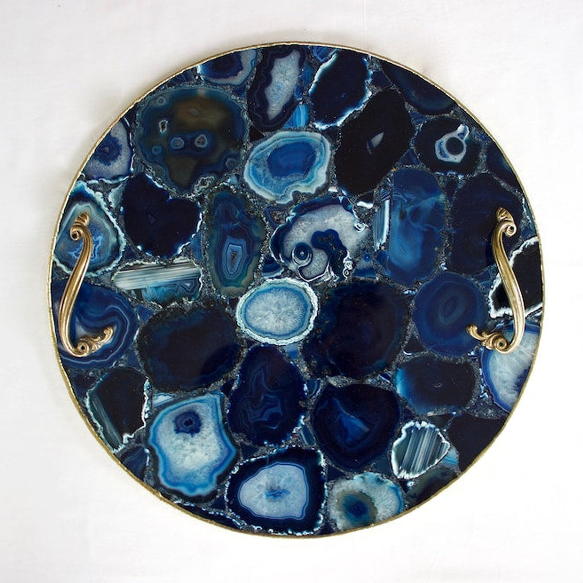 Rose gold electroforming on a round blue agate serving tray