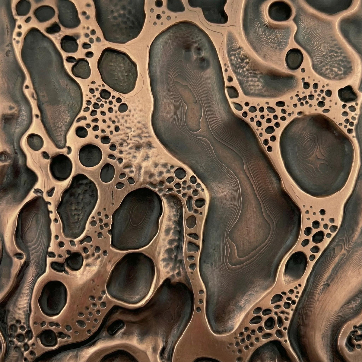 Close-up of the crater surface in antique copper