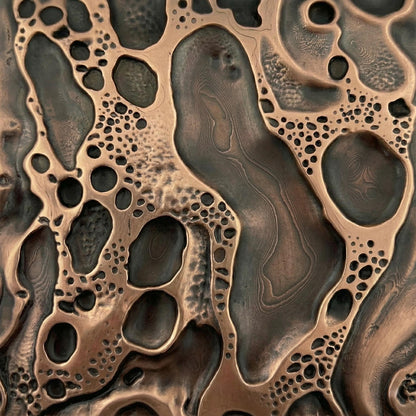 Close-up of the crater surface in antique copper