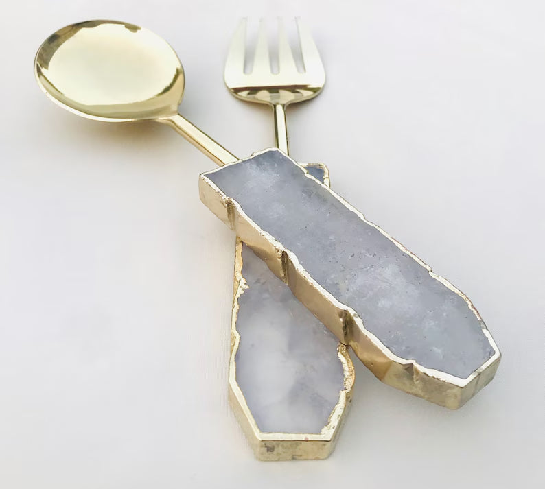 Steel bodied salad spoon with a crystal handle