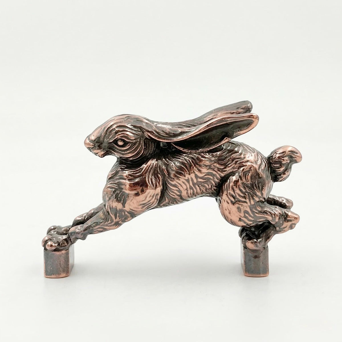 One hopping hare handle in antique copper
