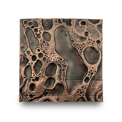 Cosmic crater tiles in antique copper