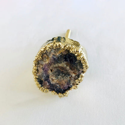 Amethyst geode knob with a rough crystal center in brown and violet and a gold edge