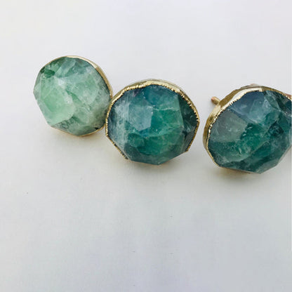 Faceted green fluorite with thick gold edging