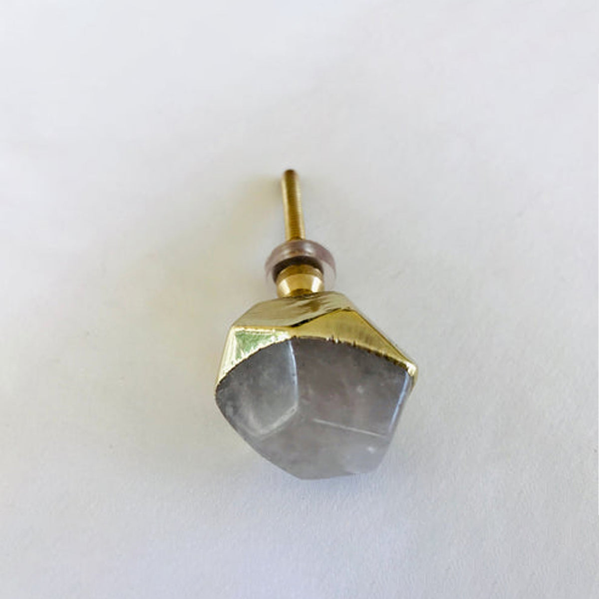 Gold electroformed edging on pink stone