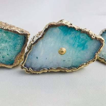 Aqua agate slice knob with a pale center and a gold edge