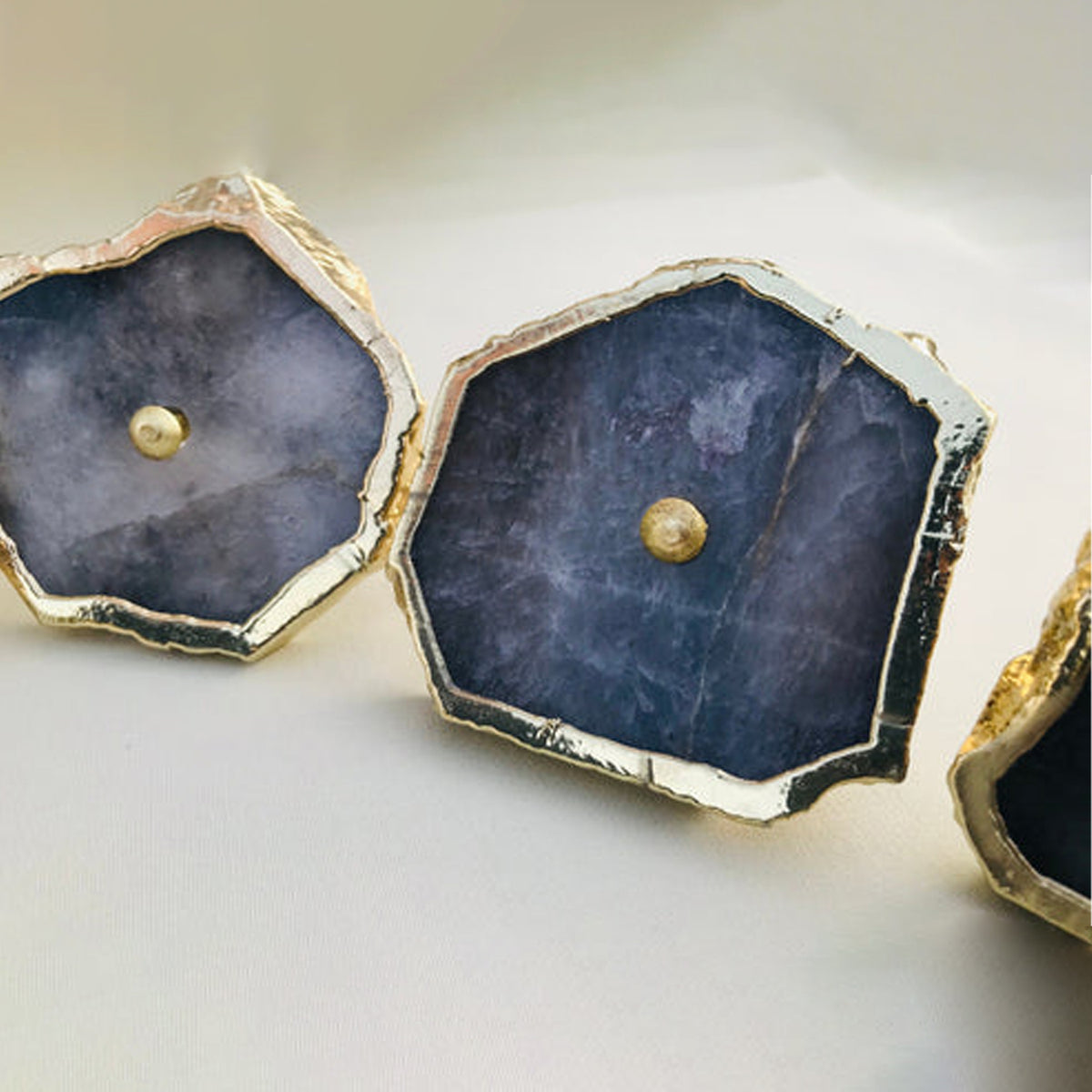 Freeform gray agate quartz slice knobs in blue-gray and slate, with gold edges