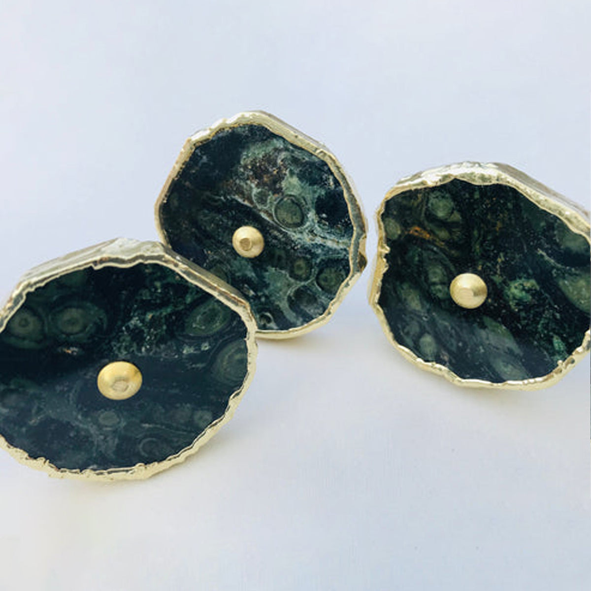 Three kambaba jasper slice cabinet knobs, dark green with round markings