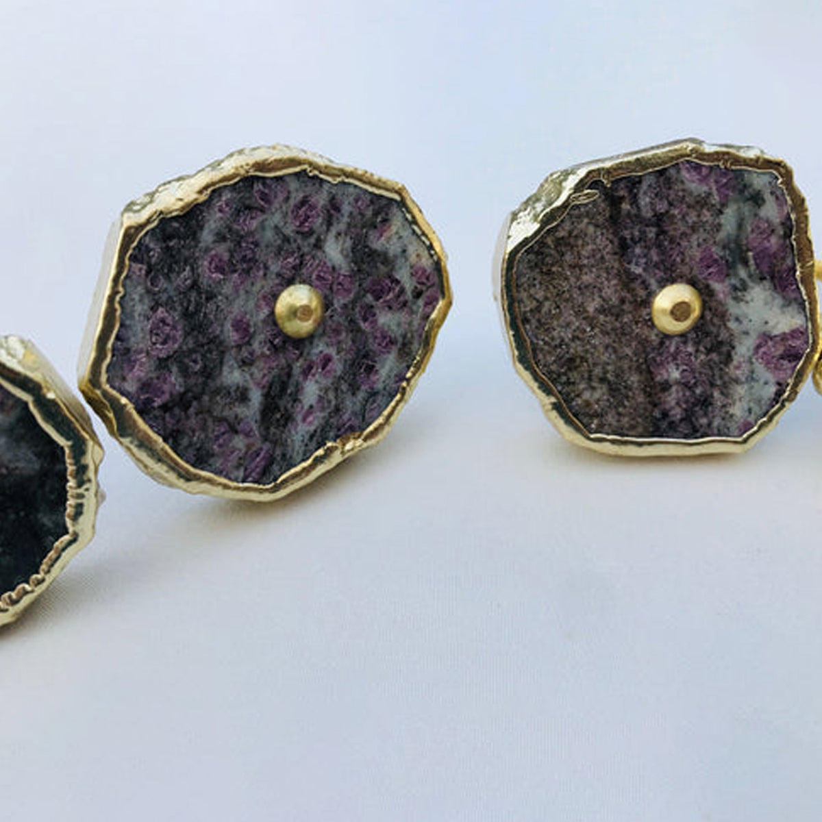 Two lepidolite slice knobs with lilac flecks