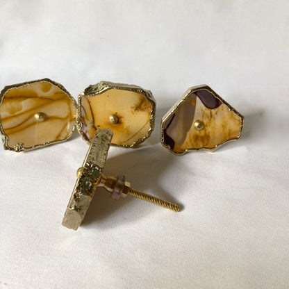 Mookaite slice knobs with one lying on its edge to show its bolt