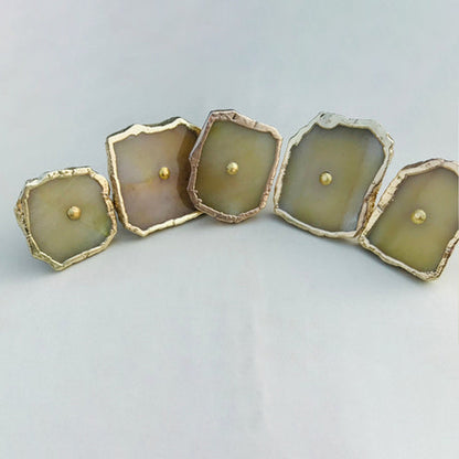 Five mustard agate slice cabinet knobs with gilded rims