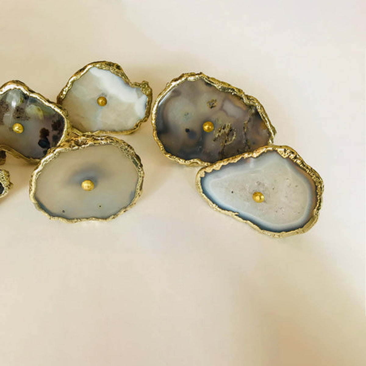 Gray agate slice knobs grouped together