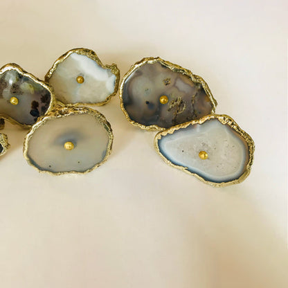 Gray agate slice knobs grouped together