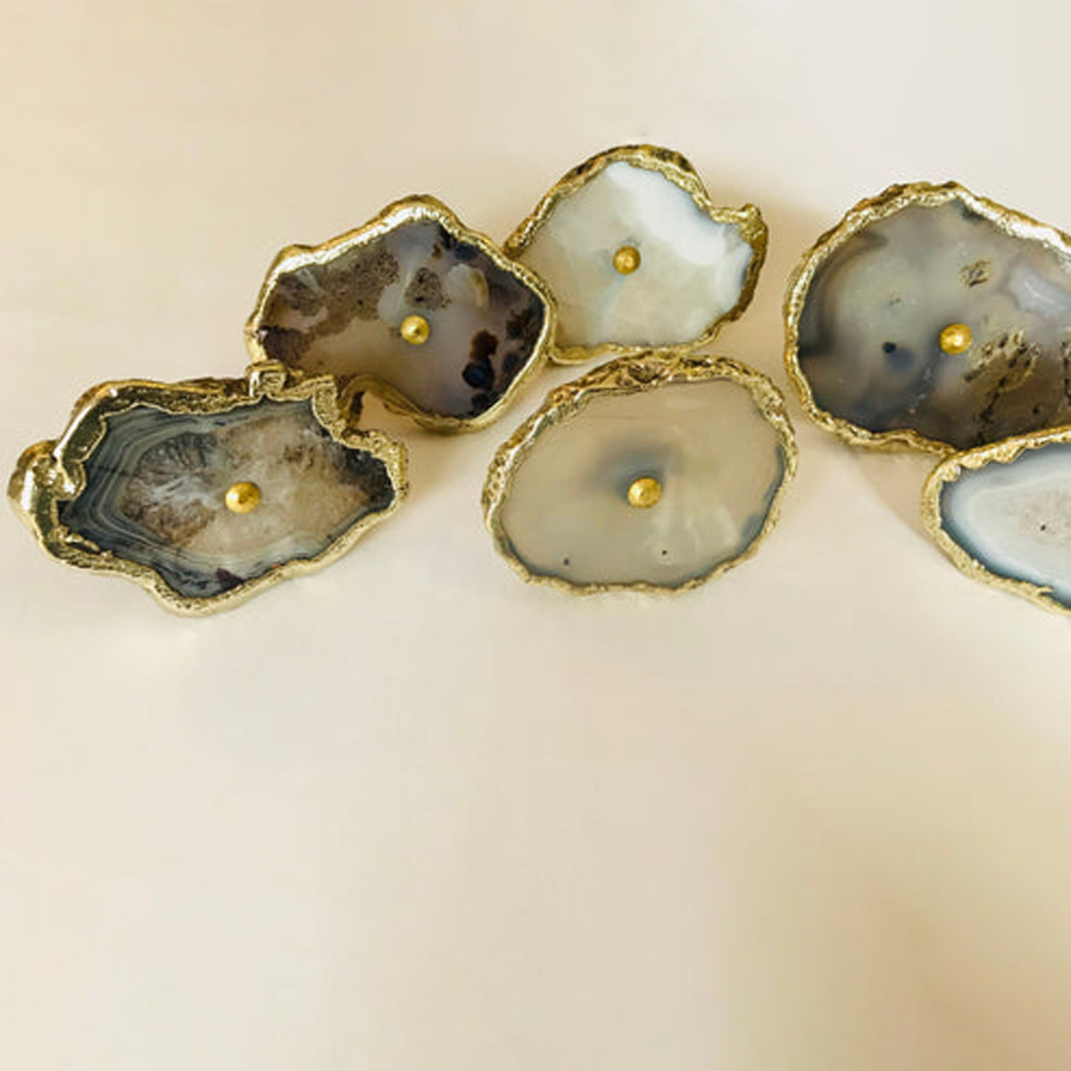 Gray agate slice knobs with gold edges