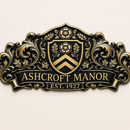 Front view of the wide Ashcroft Manor plaque with a chevron shield and scrolling leaves