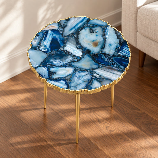 
Blue Agate Side Table, Organic Edge with a gold rim and three plain gold legs, shown full length in a room