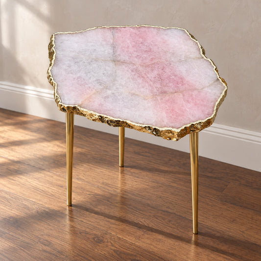 
Large Rose Quartz Side Table, Single Slab with a gold rim and three plain gold legs, shown full length in a room