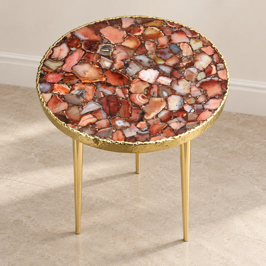 
Red Agate Side Table, Round Top with a gold rim and three plain gold legs, shown full length in a room