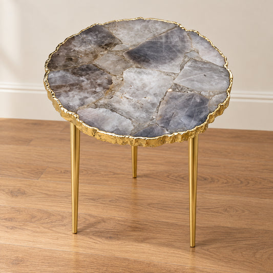 
Smoky Gray Agate Side Table, Organic Edge with a gold rim and three plain gold legs, shown full length in a room