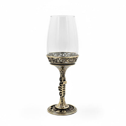 Antique brass finish wine glass with raised wording
