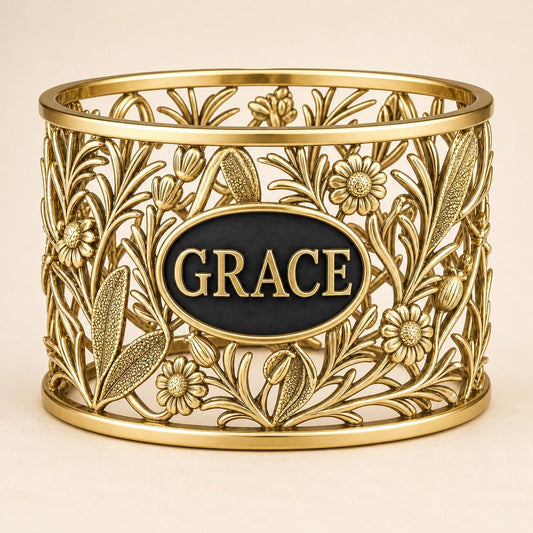 
Personalised wildflower napkin ring in gold finish with example lettering