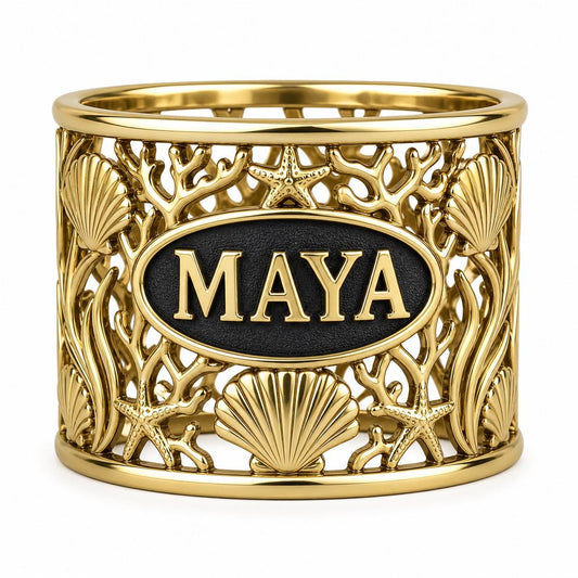 
Personalised seashell and starfish napkin ring in gold finish with example lettering