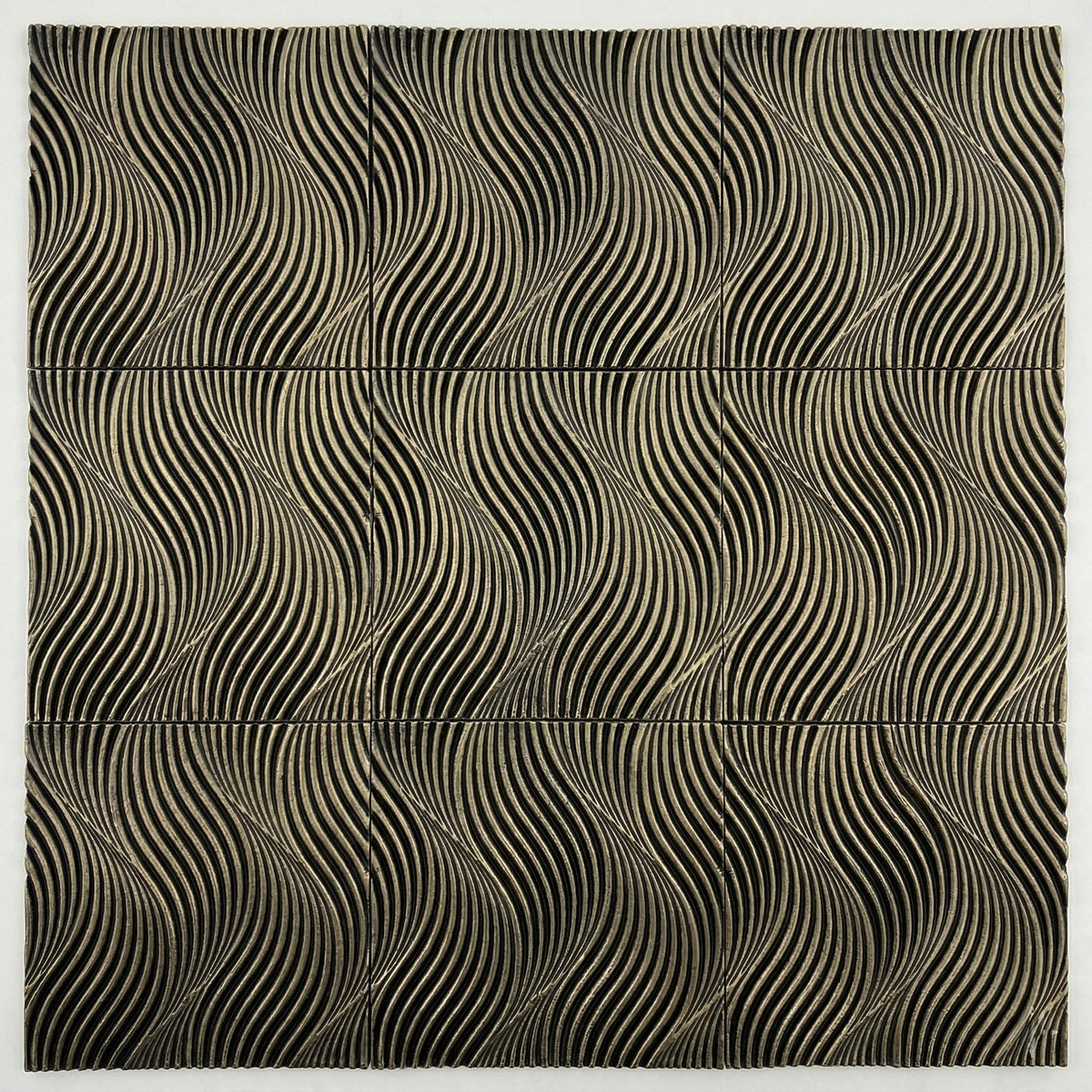 Geometric dune tiles set close together, showing the waves running on